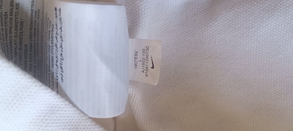 Жіноче поло Nike