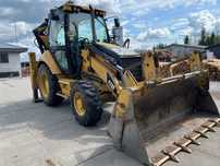 Koparko-ładowarka CATERPILLAR 428E/94KM-dodatkowo młot