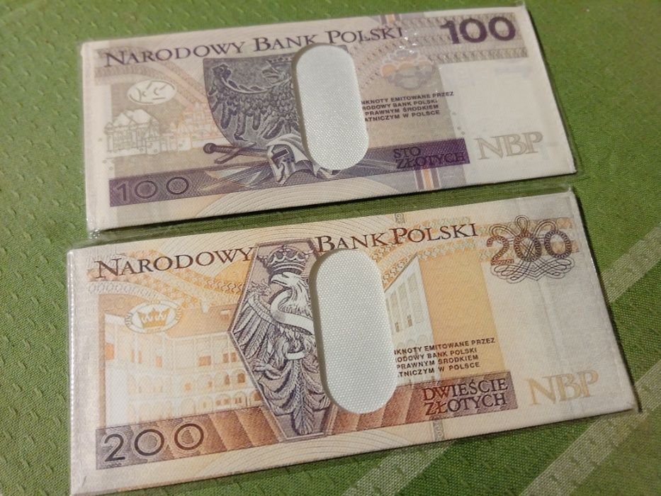 100 zł -portfel/saszetka. Extra gadżet.