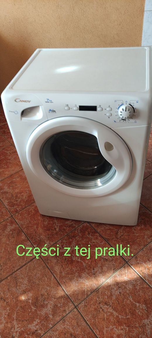 Część z pralki candy model GC 1072D2/1-S. Silnik.,moduł itp.: