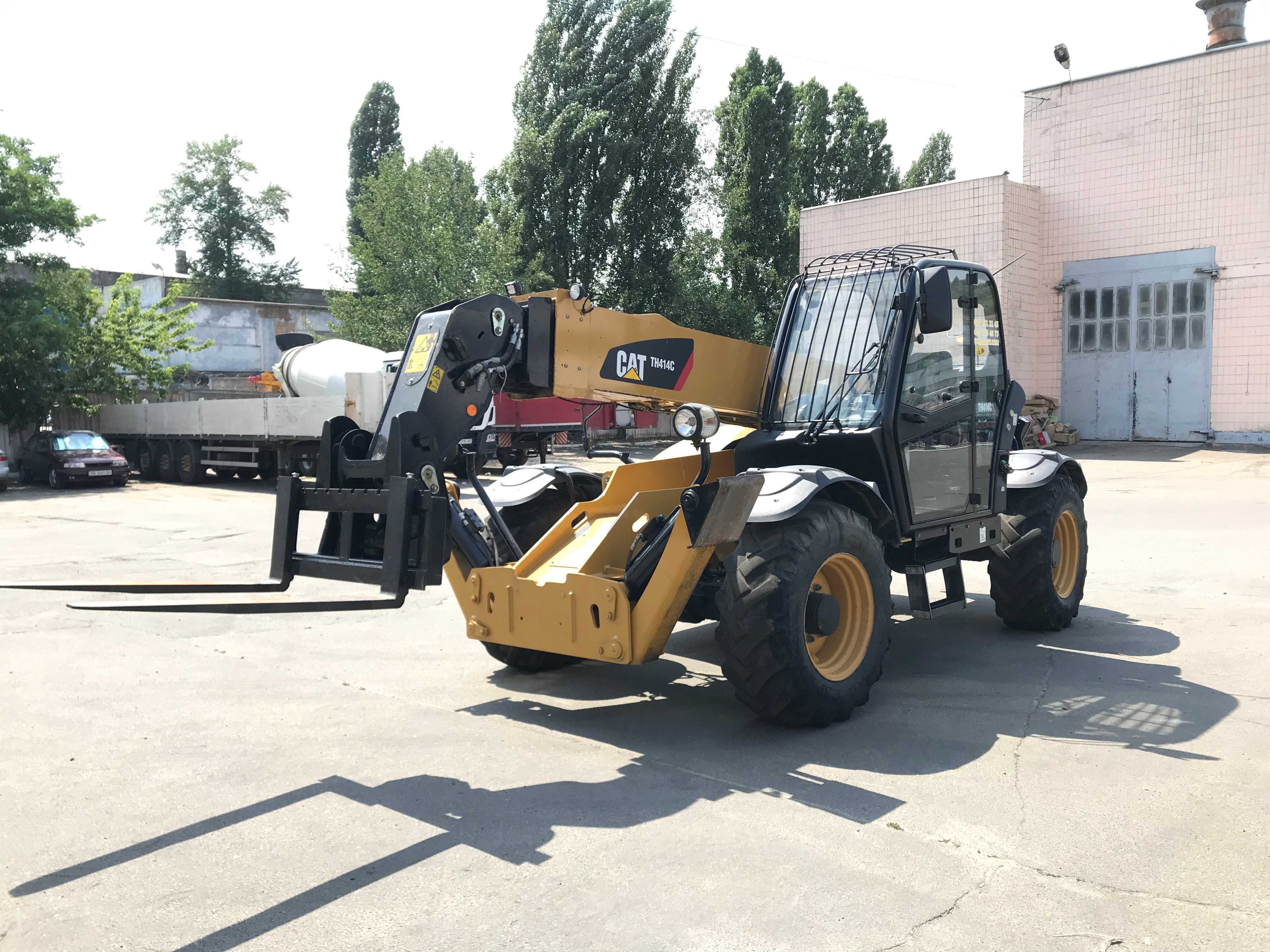 Телескопічний навантажувач CAT TH 414 C Телескопический погрузчик