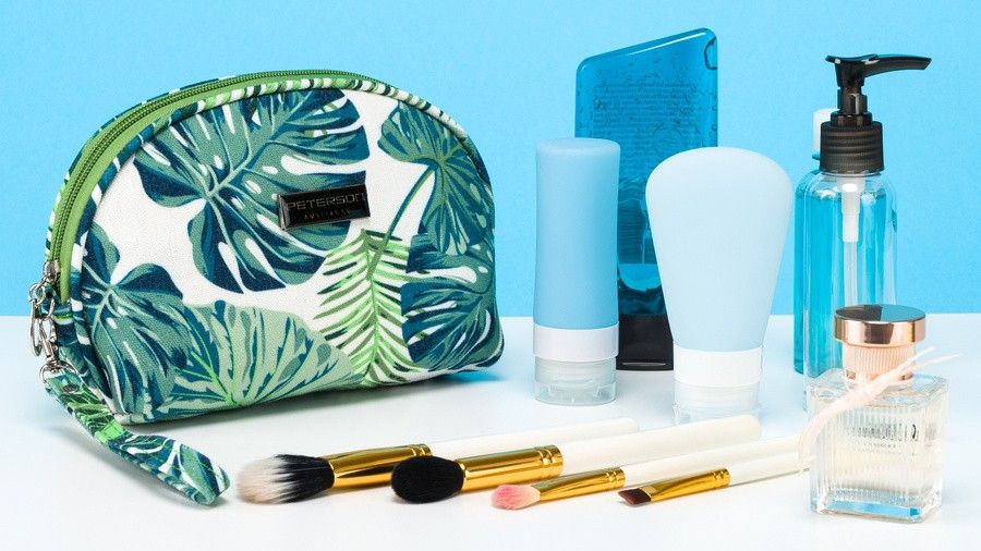 kolorowa kosmetyczka na suwak z paskiem na rękę - peterson