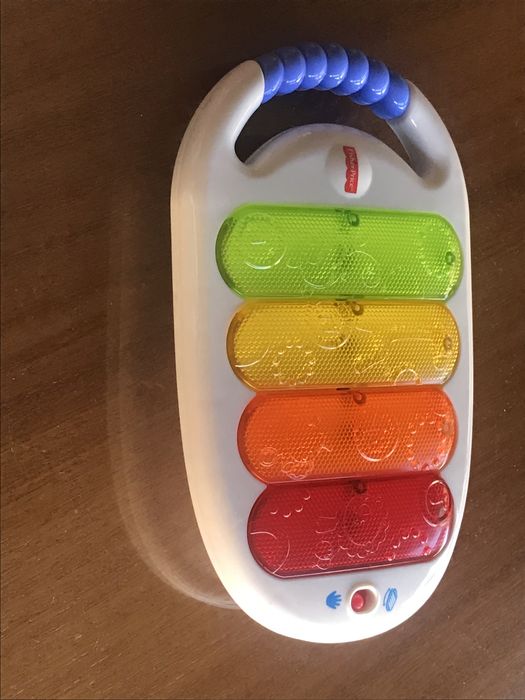 Piano de mao da marca Fisher Price