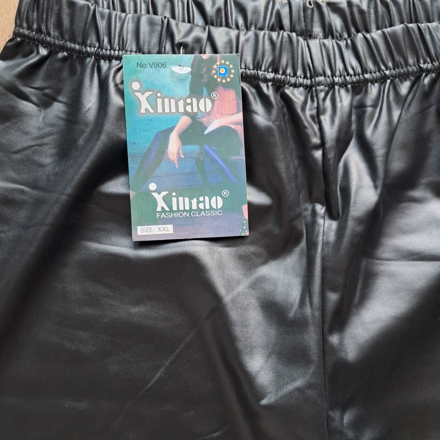 Spodnie błyszczące, podgumowane rozm. XL