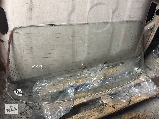 Заднее стекло Мерседес 123 с подогревом хромом уплотнителем