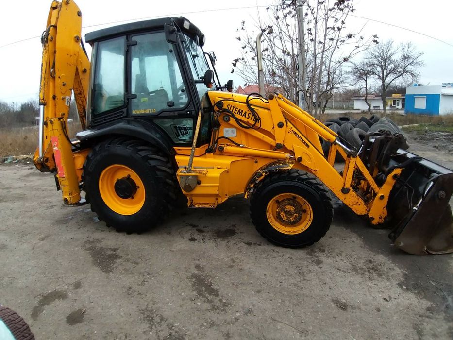 Услуги экскаватора погрузчика