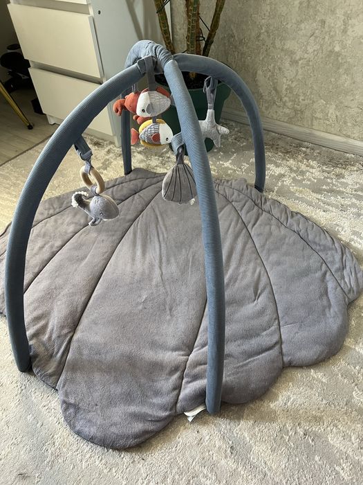 Килим для малюка в формі ракушки