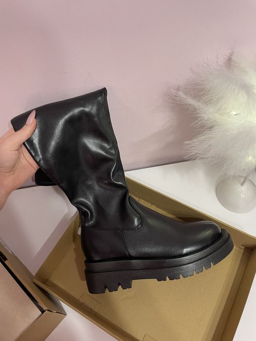 Шикарні нові ботфорти