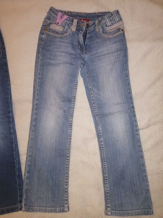 Dwie pary spodni dżinsowych - 128 cm