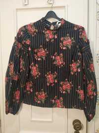 Vendo camisa com flores H&M