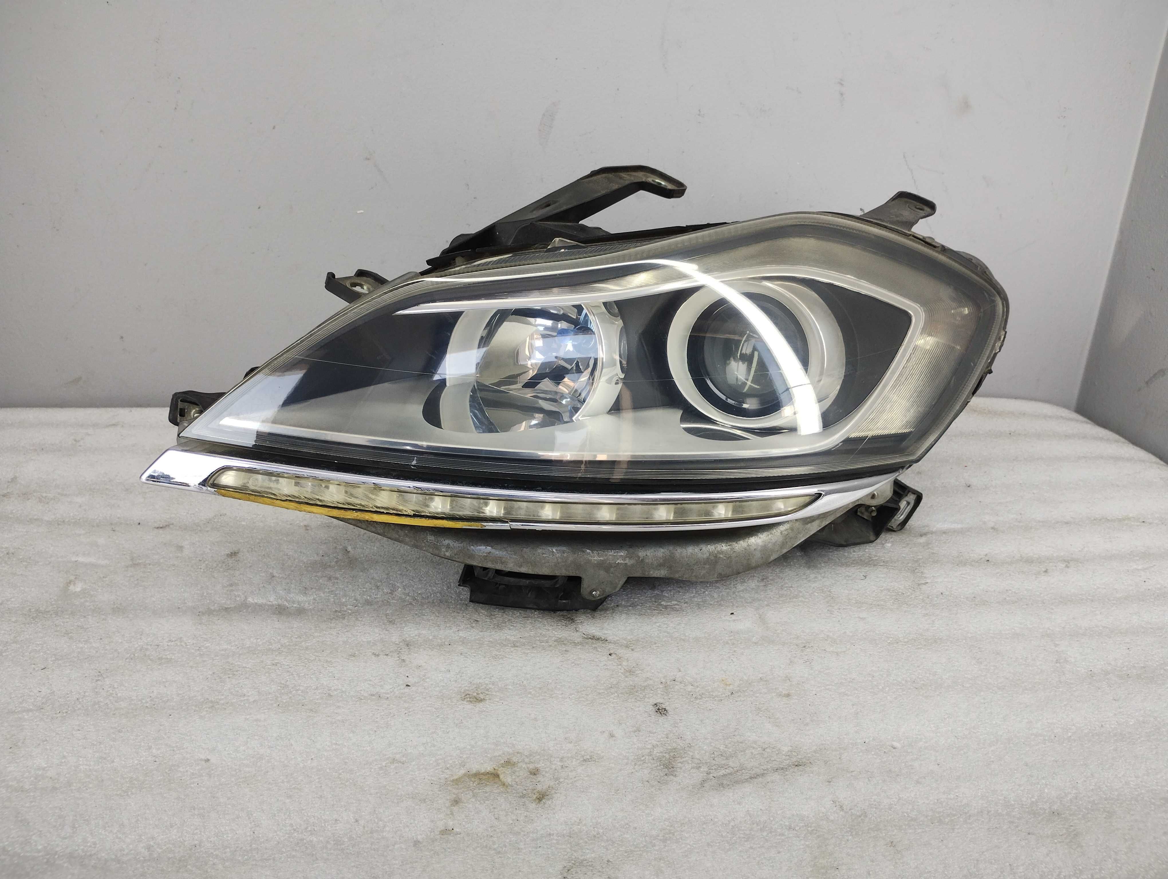 Lampa Reflektor Lewy Lancia Delta II LED DRL