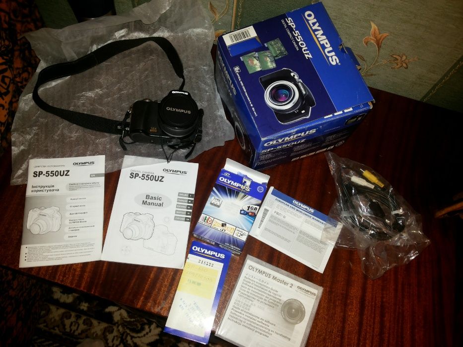 фотоаппарат OLYMPUS-SP-550 UZ +акамулятори 1620