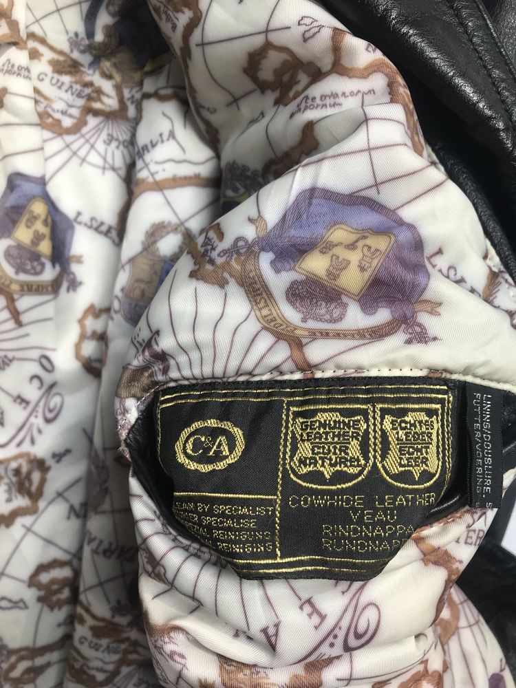 Unikatowa czarna skórzana kurtka oversize z wzorami vintage retro