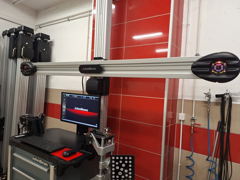 John Bean 3D V2300 Lift AC100 baza poj 24r. geometria kół zbieżność