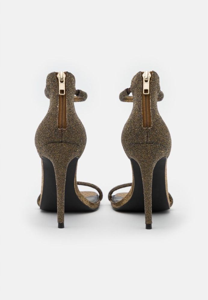 Sandały na szpilce złote Steve Madden r.38