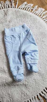Ciepłe spodnie ze stópkami Chłopiec. 68