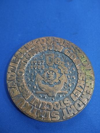 Stary medal mosiężny