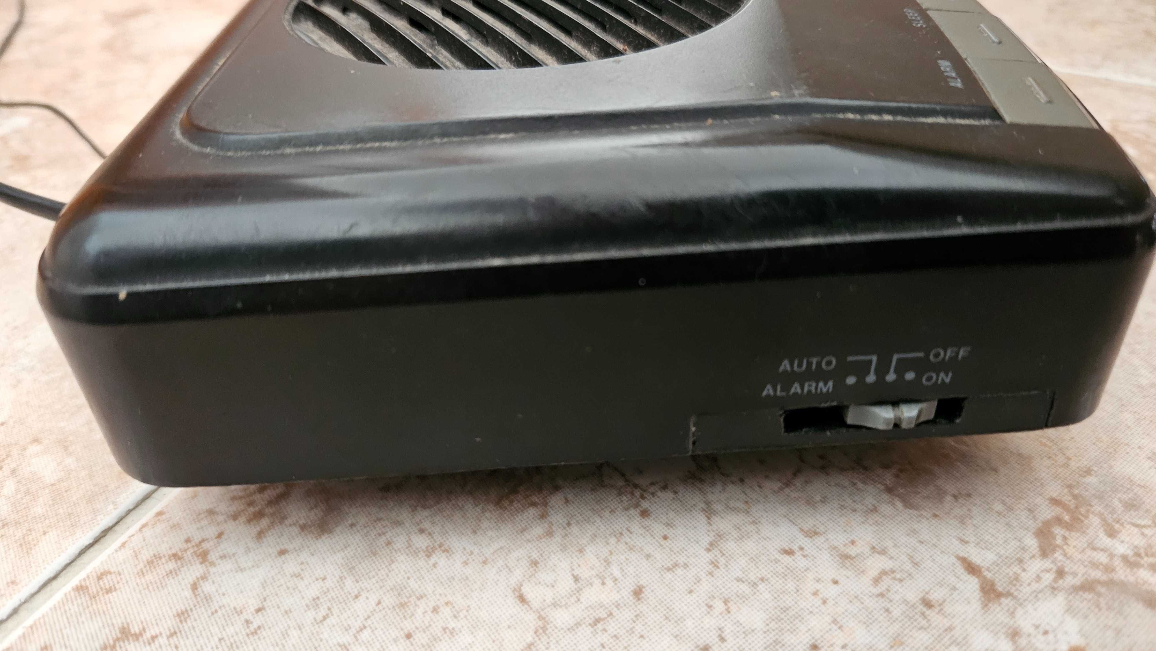 Rádio portátil com alarme