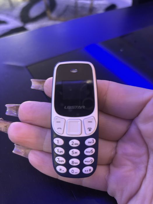 Mini telemovel usado mas como novo