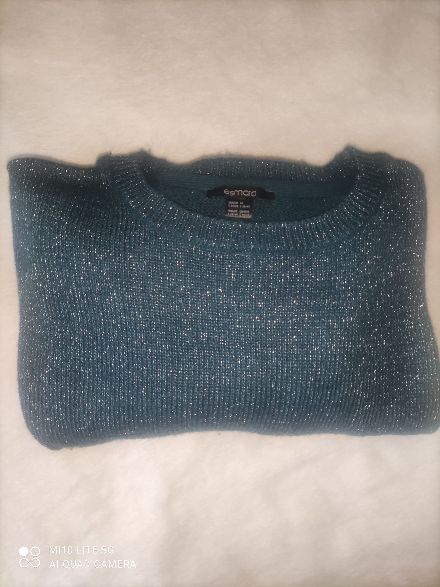 Sweter niebieski ze srebrną nitką