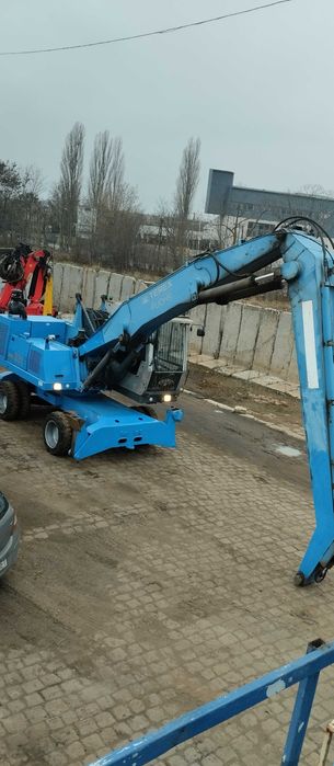 SPRZEDAM koparkę przeładunkową marki FUCHS MHL 331