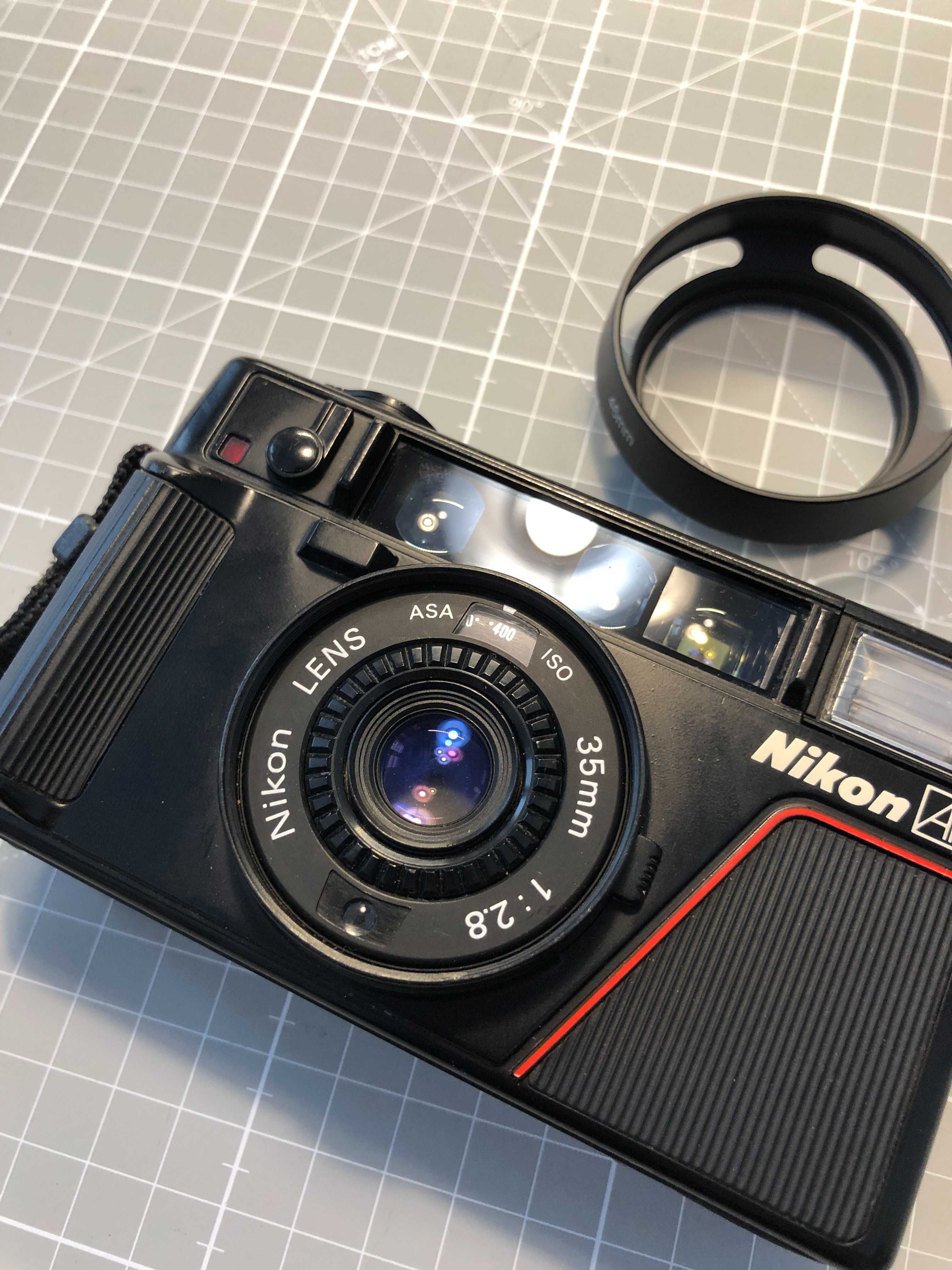 Nikon L35 AF 35mm 2.8 osłona pasek pokrowiec mju