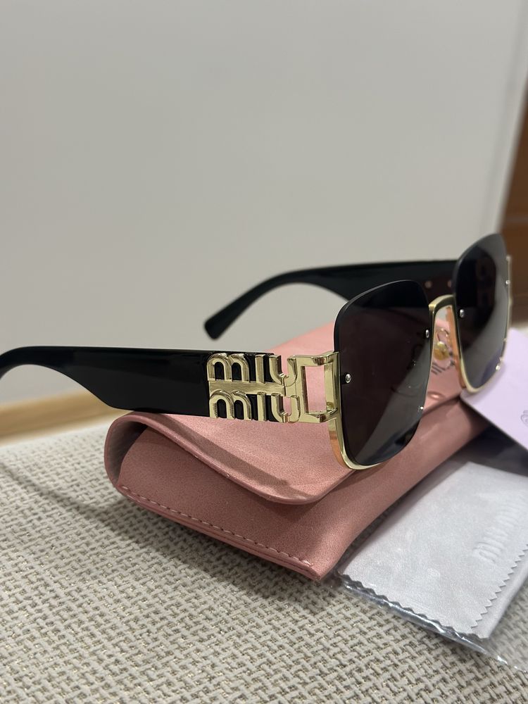 oculos miumiu em caixa