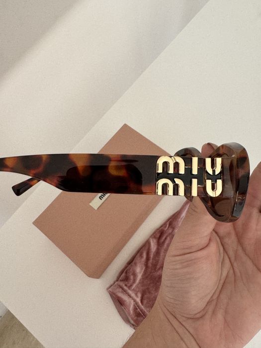 Oculos de sol MiuMiu