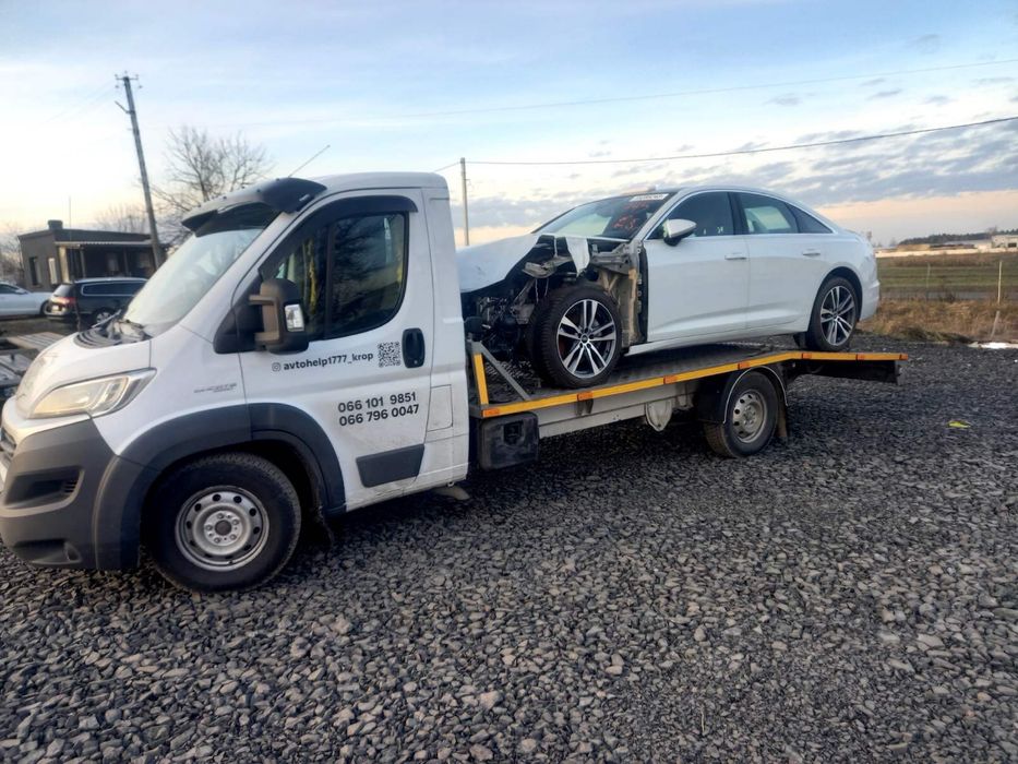 Послуги евакуатора,лафет,послуги 24/7