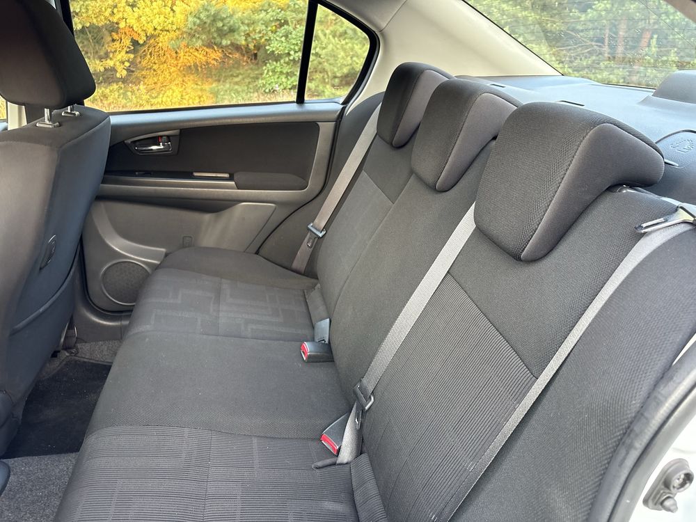 Suzuki sx4. Klimtronic biala perla