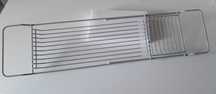 Regulowana metalowa półka na wannę 65 - 79cm