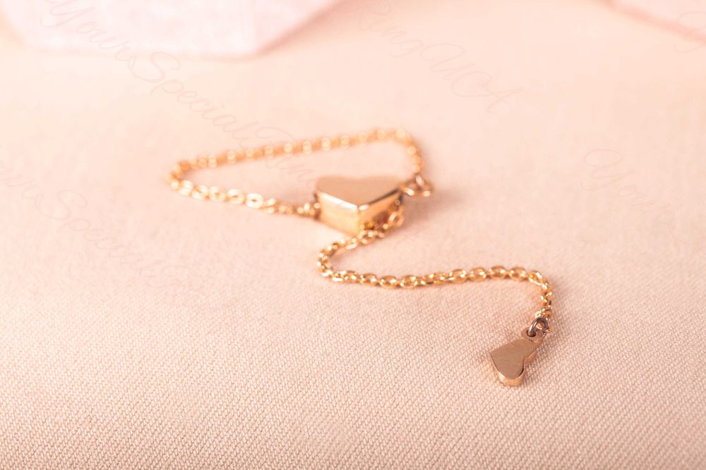 Кольцо из красного золота с цепочкой