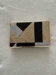 Clutch dourada da Parfois