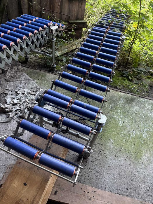 Transportery rolkowe rozciągliwe, rolkowe zakręty, transporter taśmowy