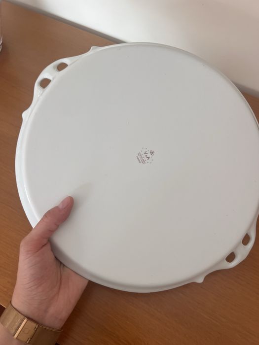 Prato rosa com flores da porcelares