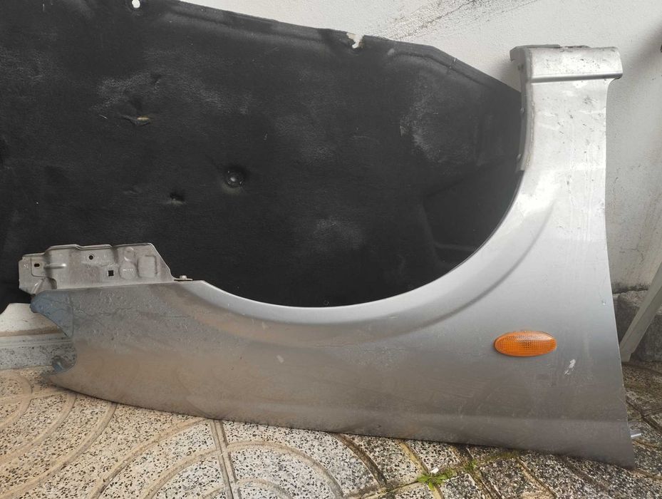 guarda-malas Nissan Almera II hatchback 1.5 dci