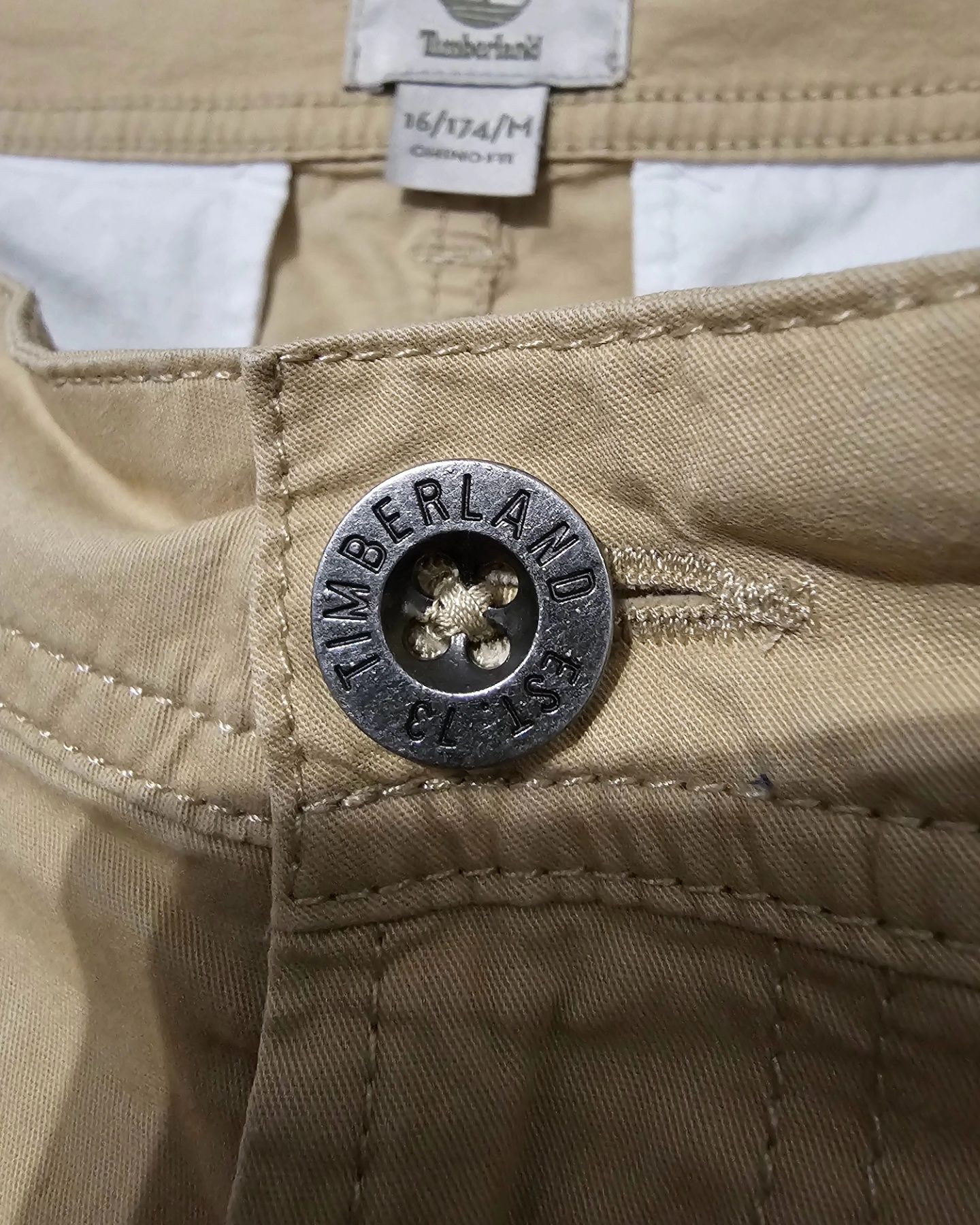 Męskie spodnie materiałowe Timberland chinos kremowe beżowe slim rurki