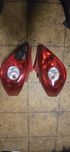 Lampa lampy lewa prawa tylna tył Opel Corsa D