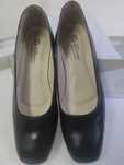 Sapatos académicos em pele