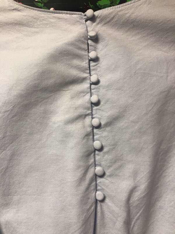 Zara - błękitna asymetryczna bluzka z krótkim rękawem roz M