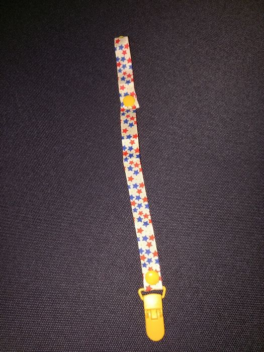 Тримач для пустушки/гризунка/ніблеру/брязкальця з кліпсою Різнок