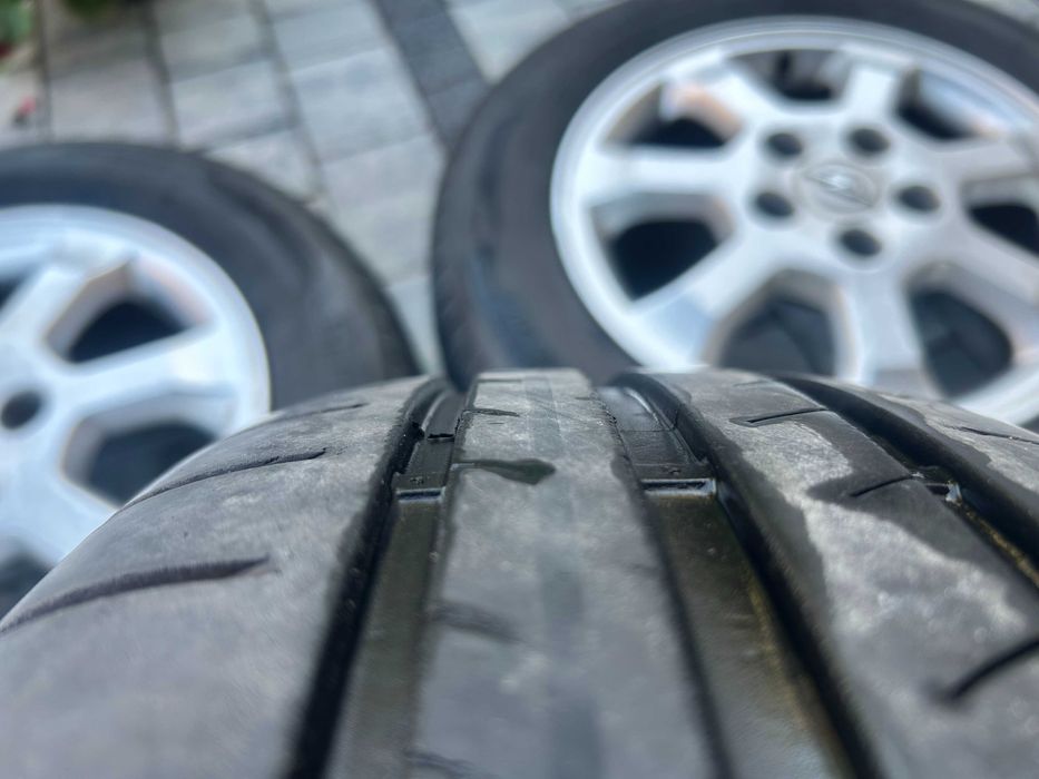 Felgi aluminiowe 15" z oponami letnimi Opel