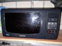 Kuchenka mikrofalowa Samsung MW733K USZKODZONA!