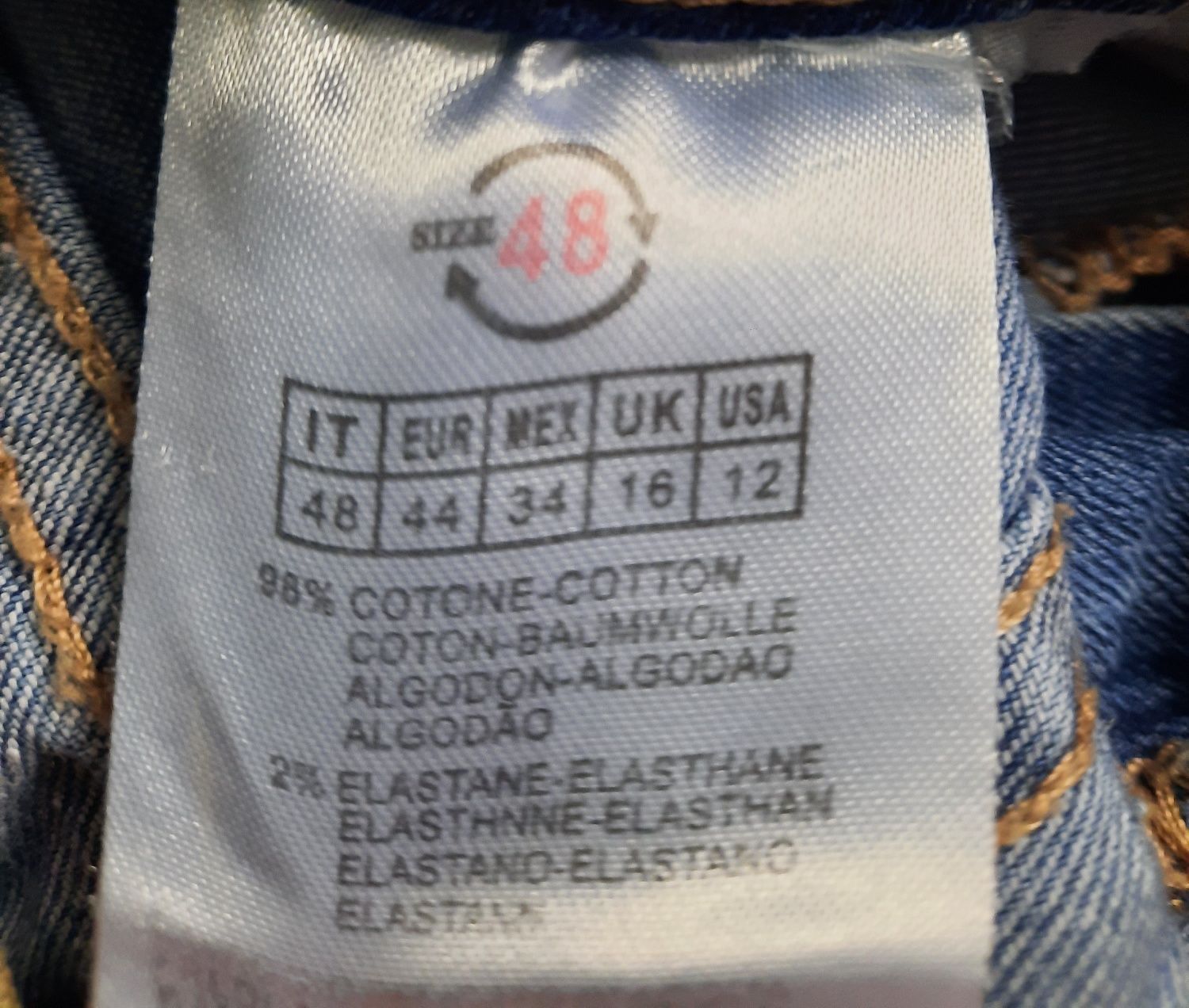 Spodnie jeans błękit cieniowane z modnymi rozdarciami Pas 80cm