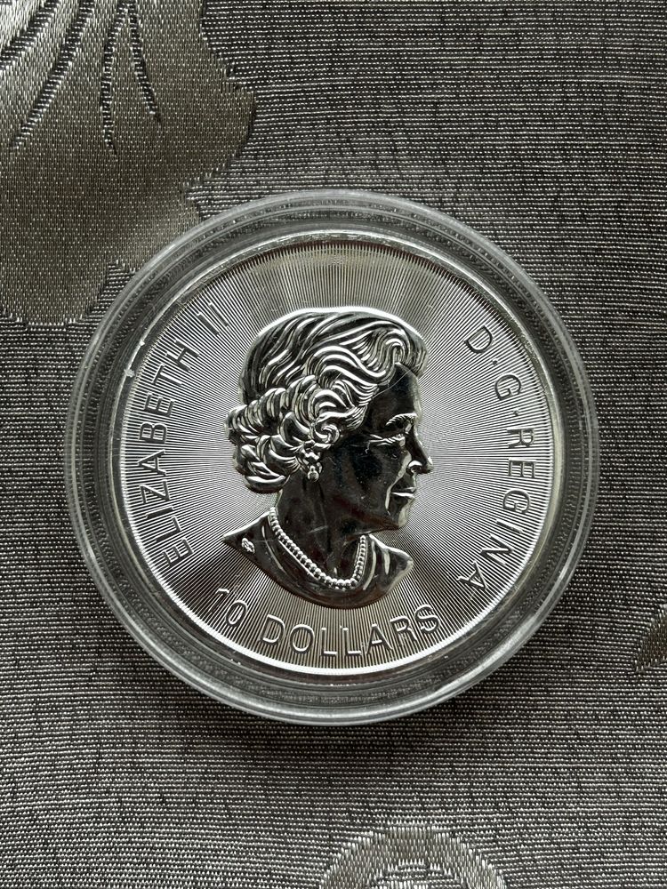 Серебряная монета 62,2 гр