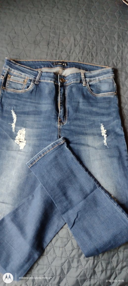 Spodnie z dziurami jeansy rozm. 46