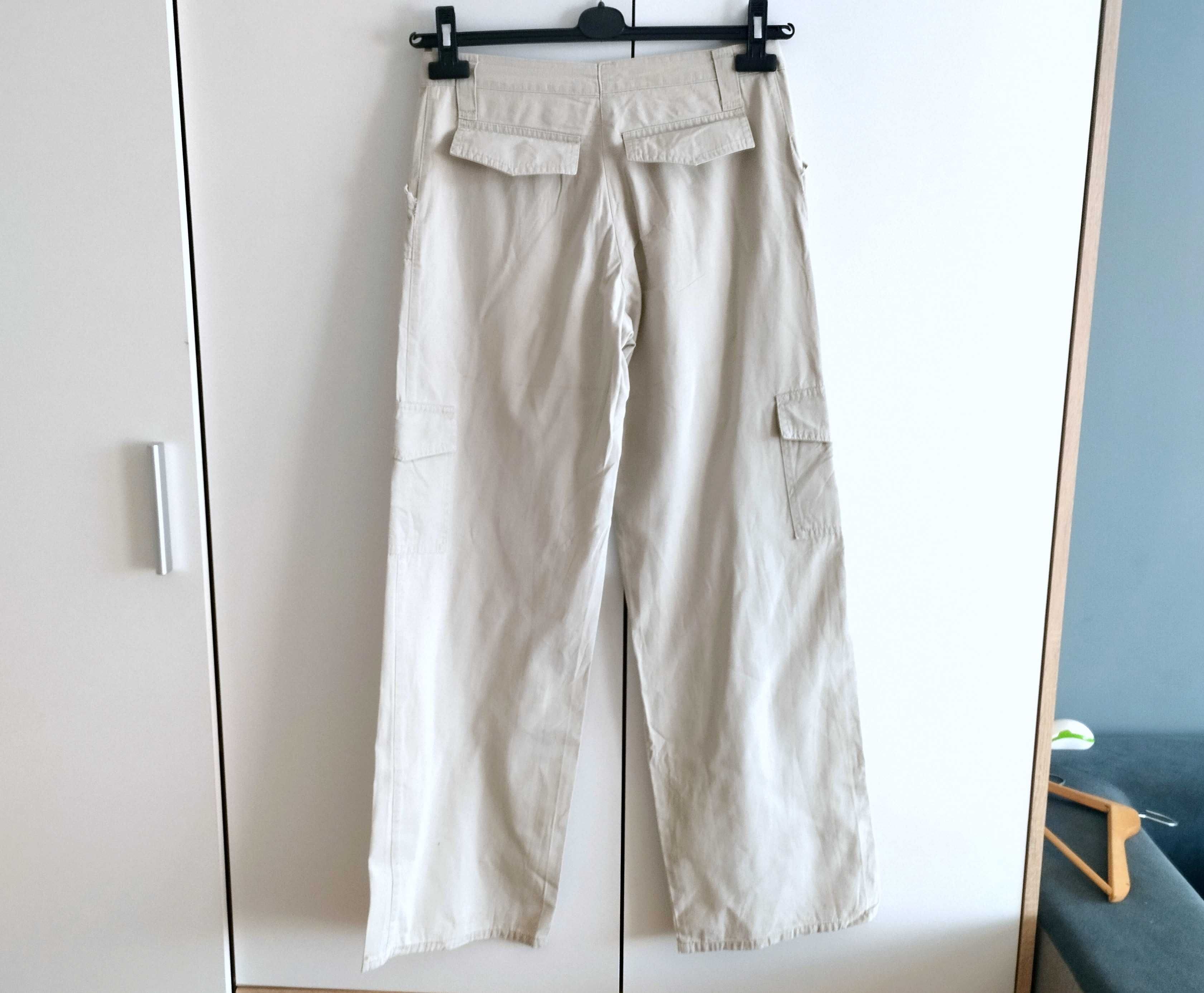 Spodnie damskie biało-kremowe rozmiar 36 bojówki