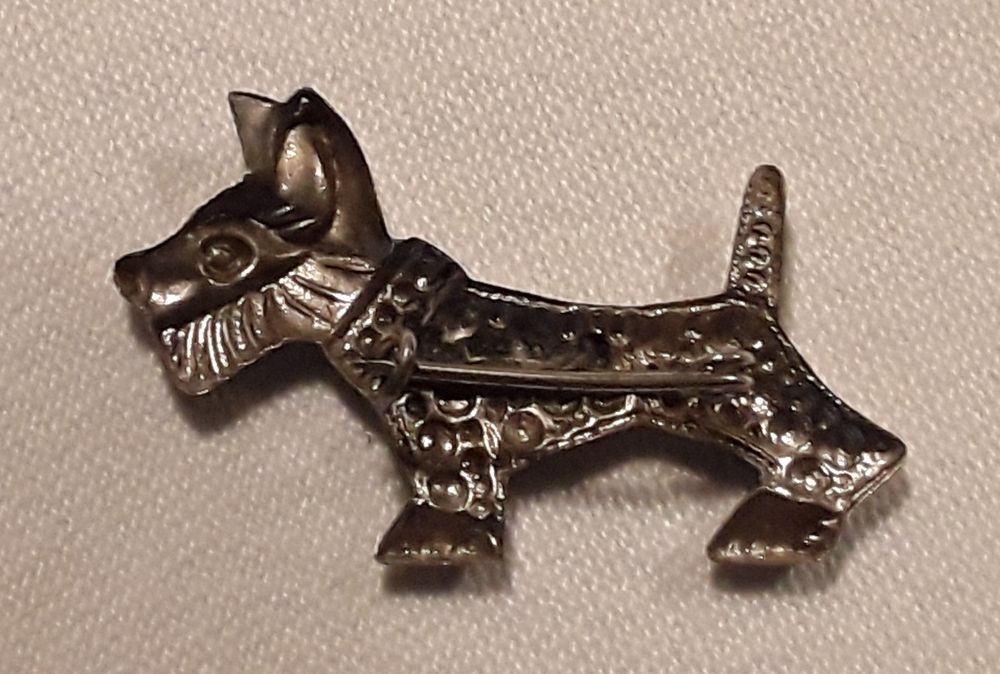 Pregadeira antiga Fox Terrier