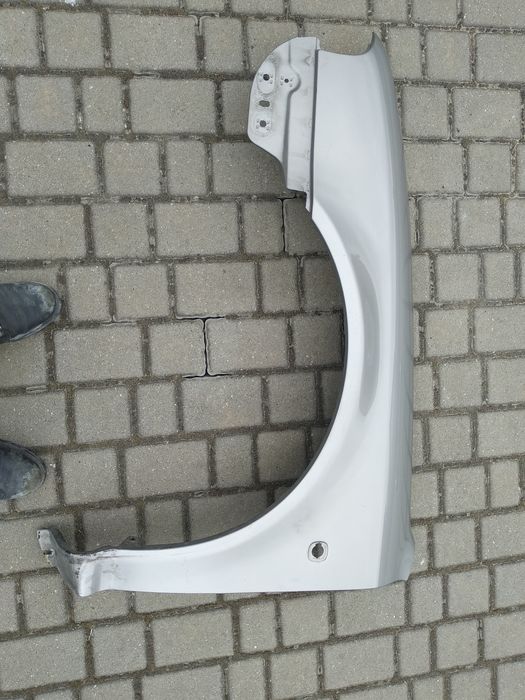 Błotnik lewy przód Skoda Octavia I kolor 9202