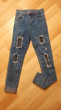Spodnie jeansowe z dziurami roz. 36